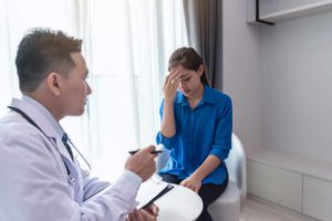 doctor talks with woman about an intensive outpatient program near atlanta