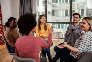 people in a group therapy sessions discuss the best drug detox near atlanta, GA