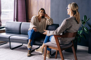 therapist and client talk in an ecstasy abuse rehab session